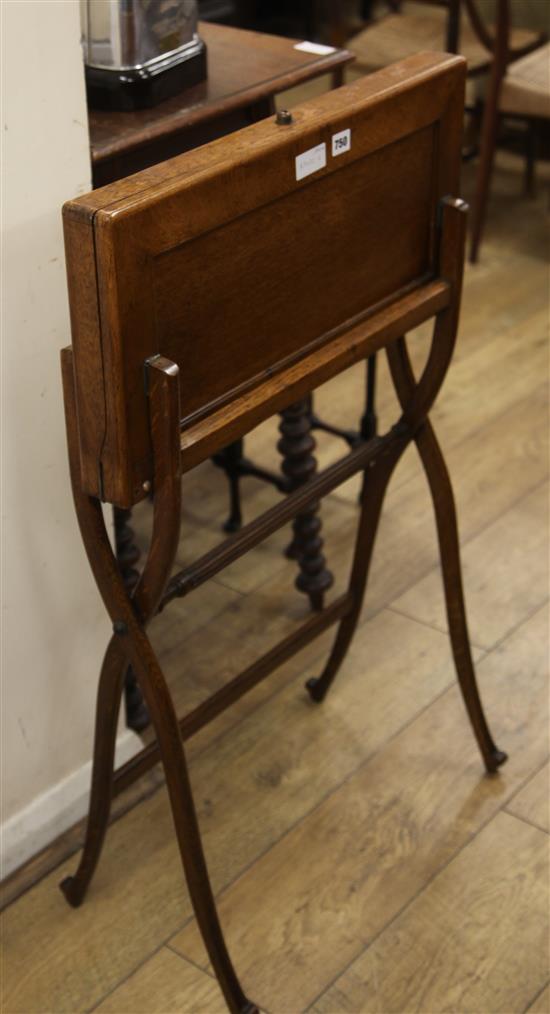 An Edwardian oak travelling desk W.61cm